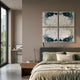 Volara Azure Flight Paper & Acrylic 3D Wall Art by Giant Sculptures, a 2×2 panel set of azure and white butterflies, mounted above a bed with green linen.