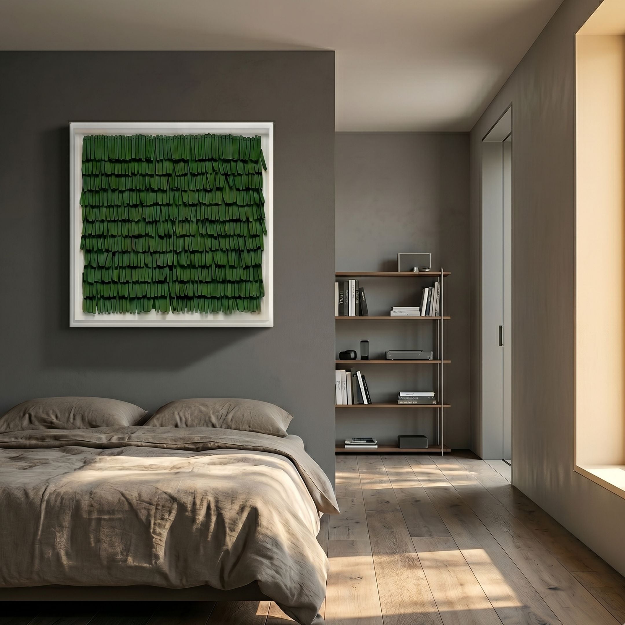 Frondra Green Layered Leather 3D Wall Art by Giant Sculptures, displayed in a modern bedroom above a linen-dressed bed beside a wooden bookshelf.