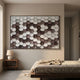 Scalara Brown & White Acrylic 3D Wall Art by Giant Sculptures mounted above a walnut nightstand and linen-dressed bed in a warm neutral bedroom.