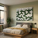 Scalara Green & White Acrylic 3D Wall Art by Giant Sculptures displayed above a grey upholstered bed in a sage-green bedroom with a fiddle leaf fig.