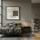 Lustrosa Pearl & Shell Mosaic I 3D Wall Art by Giant Sculptures, framed above a bed with grey linen in a modern bedroom with concrete floor and bookshelf.