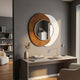 Solistra Amber II Layered Round Mirror 3D Wall Art by Giant Sculptures, gold-framed circular mirror over rusty amber and white backplates, mounted above a desk.