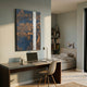 Yinjaro Navy & Bronze Temple Landscape 3D Wall Art displayed above a wooden desk with laptop in a modern home office, beside a bed and bookshelf nook.