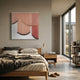 Dravena Warm Coral Elegance Ribbon 3D Wall Art by Giant Sculptures, with blush rods, black tips and gold discs, mounted above a wooden bed in a modern bedroom.