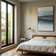 Sevara Aqua Layered Hand-Painted 3D Wall Art in a sunlit bedroom, hung above a wooden bed with linen bedding beside a window opening to a leafy balcony.
