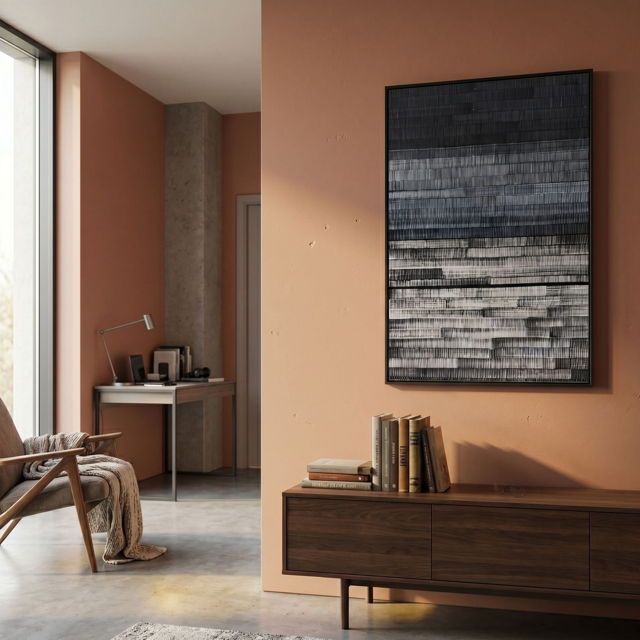 Chromastrata Monochrome Tiers Layered 3D Wall Art by Giant Sculptures mounted on a terracotta wall above a walnut sideboard with books in a modern living space.
