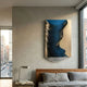 Arvinea Cobalt Curve Sculptural Leather 3D Wall Art by Giant Sculptures, cobalt blue ridged leather sweep on brushed gold panel, displayed above a bedroom headboard.
