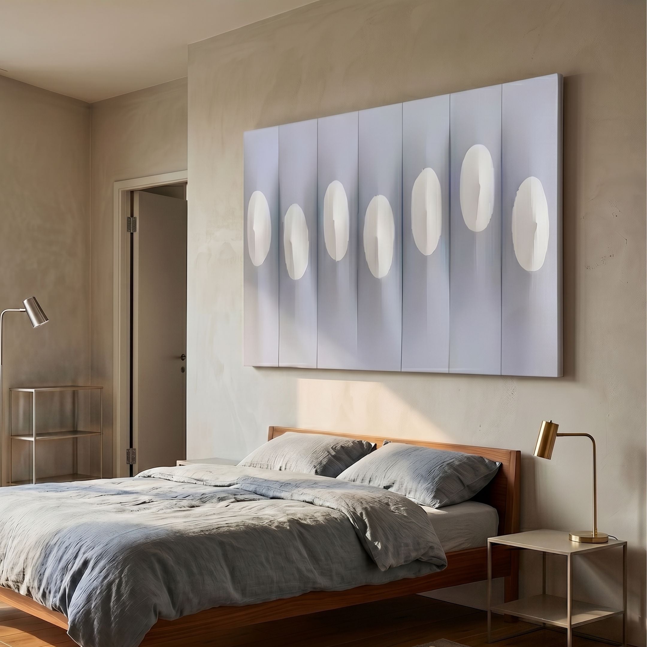 Virello Soft Blue & White Disc Leather 3D Wall Art by Giant Sculptures mounted above a wooden bed with grey linens in a warm Nordic bedroom.