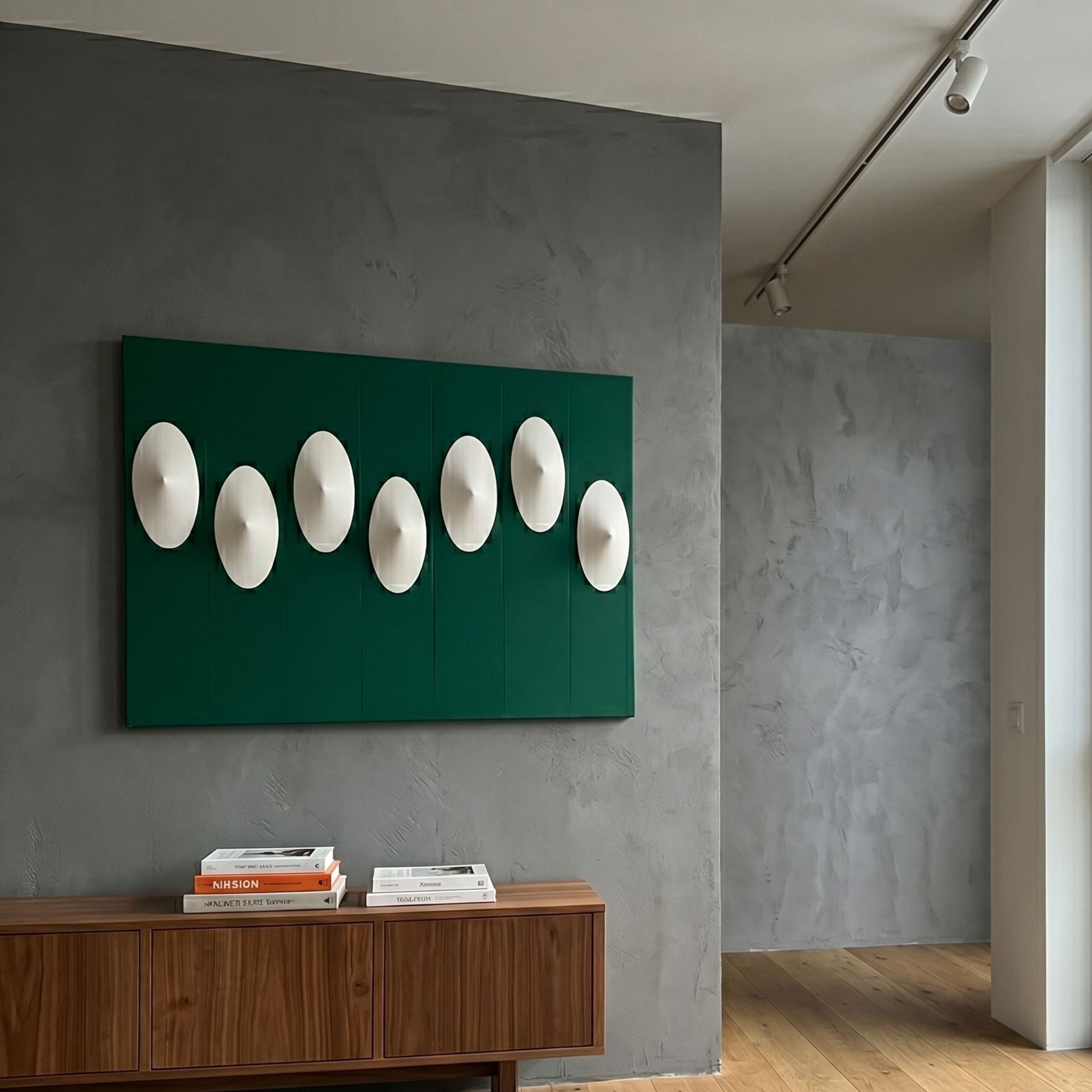 Virello Deep Green & White Disc Leather 3D Wall Art by Giant Sculptures with seven concave white discs on vertical green panels above a walnut sideboard.
