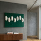 Virello Deep Green & White Disc Leather 3D Wall Art by Giant Sculptures with seven concave white discs on vertical green panels above a walnut sideboard.