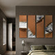Cuvora 4-Panel Misty Pines Leather 3D Wall Art by Giant Sculptures, mounted above a bed in a warm grey bedroom with gold-edged peels revealing ink-wash pine landscapes.