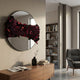 Stravelle Red & Black Fold Leather Mirror 3D Wall Art mounted above a walnut sideboard in a modern living room with bookshelves and a grey armchair.