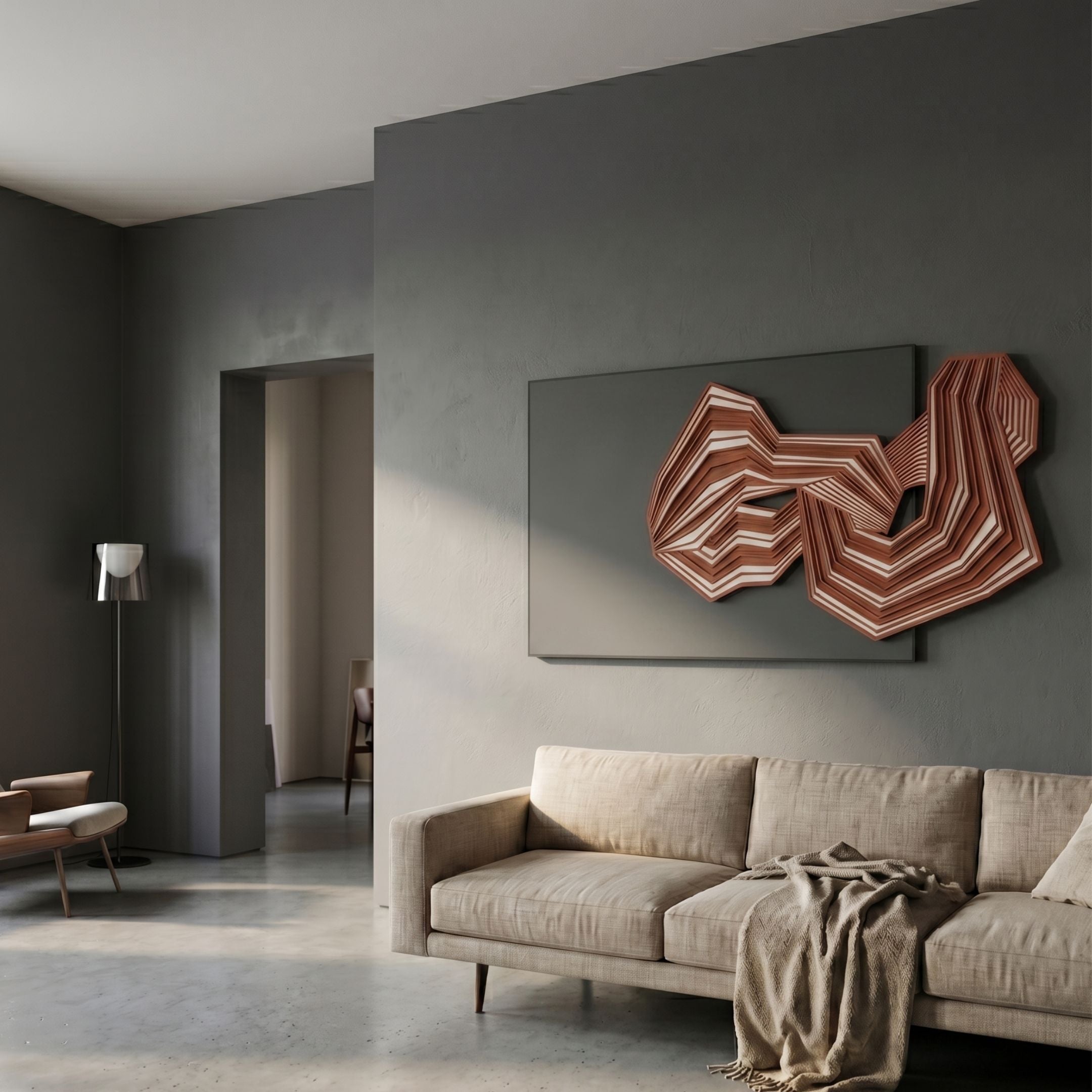 Riborra Black & Deep Red Layered Wood Carving 3D Wall Art by Giant Sculptures mounted above a beige sofa in a grey-walled modern living room.
