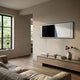 Ventura Charcoal & White Fold Leather 3D Wall Art by Giant Sculptures mounted above a low oak console with books in a sunlit modern living room.