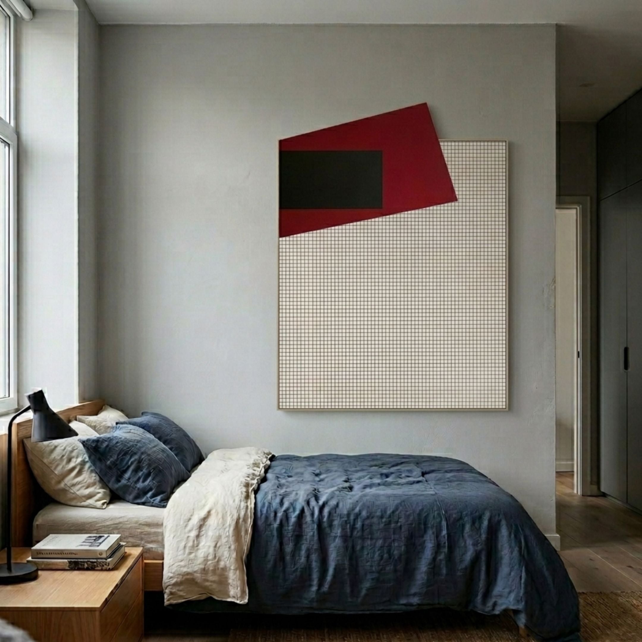 Gridorra Black & Red Leather Grid Panel 3D Wall Art by Giant Sculptures displayed above a wooden bed with navy linens in a modern grey bedroom.