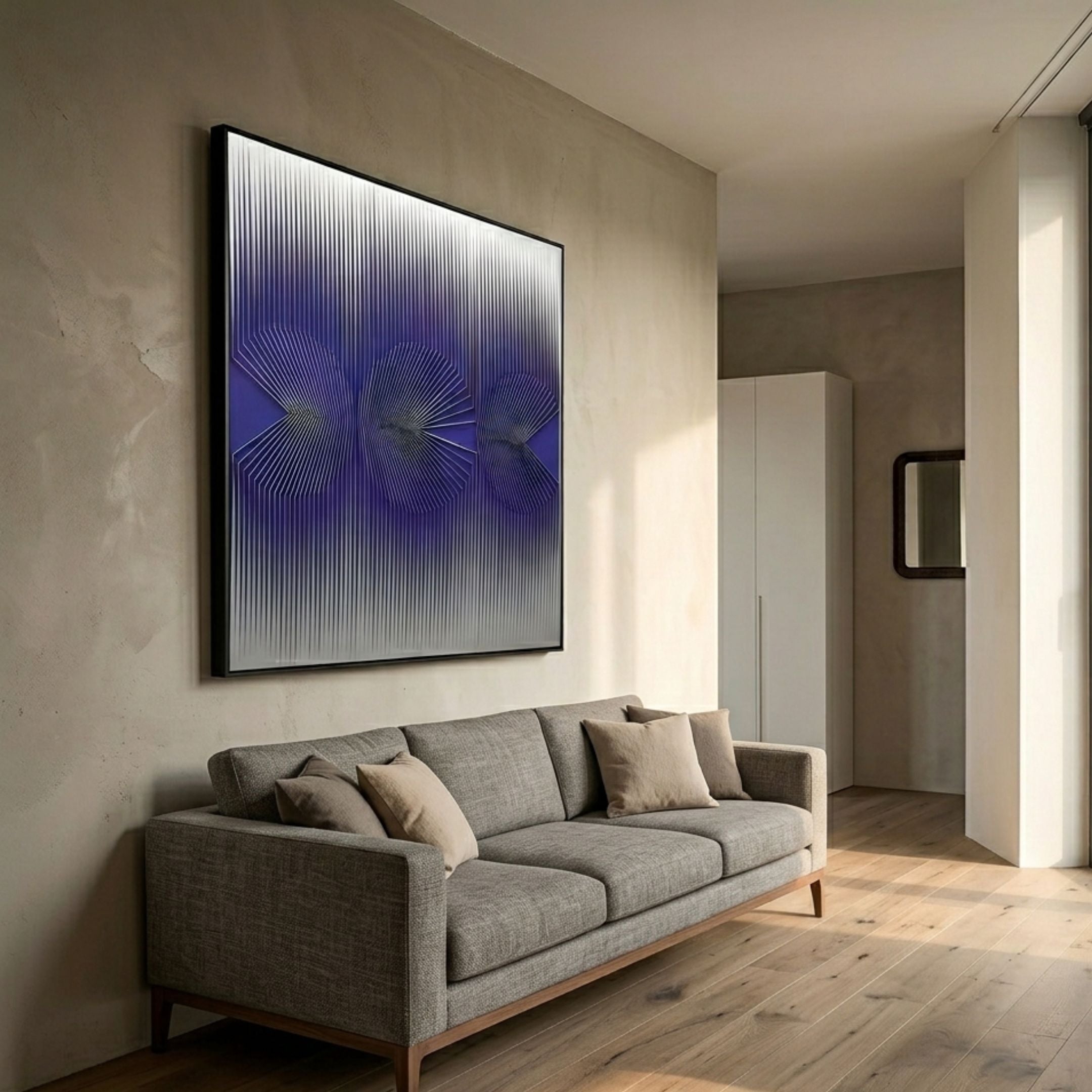Vectra Purple Orbital Gradient Leather 3D Wall Art by Giant Sculptures displayed above a grey sofa with linen cushions in a modern living room.