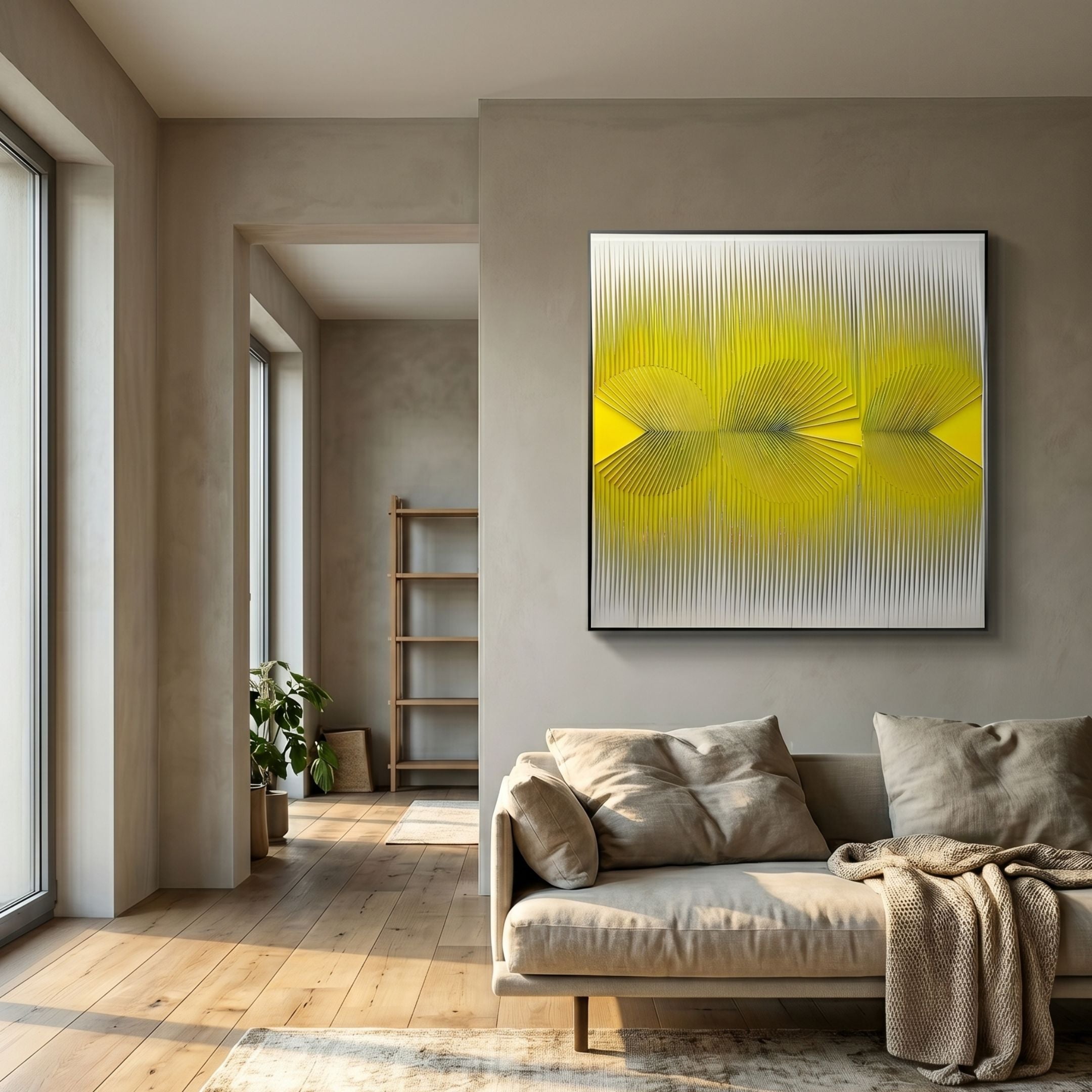 Vectra Yellow Orbital Gradient Leather 3D Wall Art by Giant Sculptures displayed above a beige sofa in a neutral living room with wood flooring.