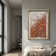 Florasca Copper Ripple Leather 3D Framed Wall Art by Giant Sculptures displayed above a linen-dressed bed in a modern bedroom with hallway view.