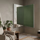 Grilith Green Grid Mirror Dual Panel 3D Wall Art by Giant Sculptures mounted across a corner in a neutral living room with monstera plants and a beige sofa.