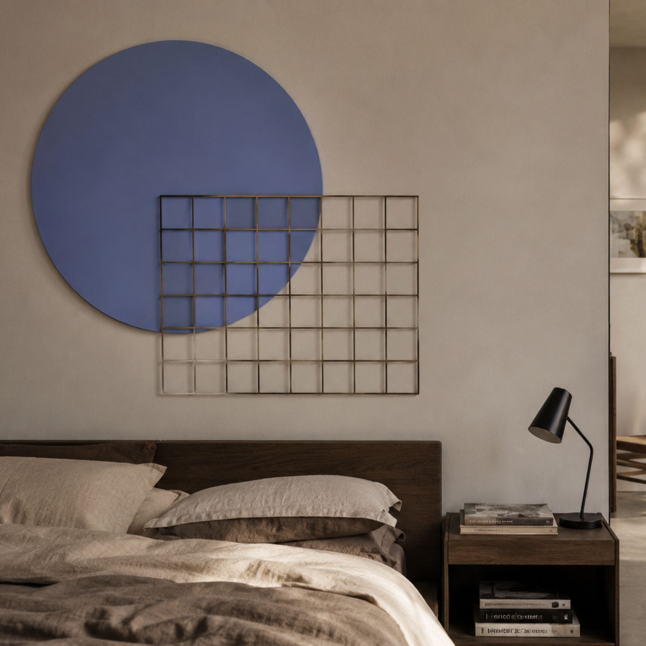 Orivis Indigo Disc Metal Grid 3D Wall Art by Giant Sculptures mounted above a dark wood bed with linen bedding, bedside table and black lamp.