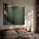 Grilith Green Textured Mirror Dual Panel 3D Wall Art by Giant Sculptures, mounted above a wooden bed with linen bedding, beside a bookshelf in a sunlit bedroom.