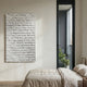 Cavara Gridfall Textured White 3D Relief Wall Art by Giant Sculptures displayed in a minimalist bedroom beside a tall black-framed window and linen-dressed bed.