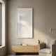 Varelo Vertical Geometric Relief 3D Wall Art by Giant Sculptures displayed above a light oak sideboard in a minimalist beige living room with a linen armchair.