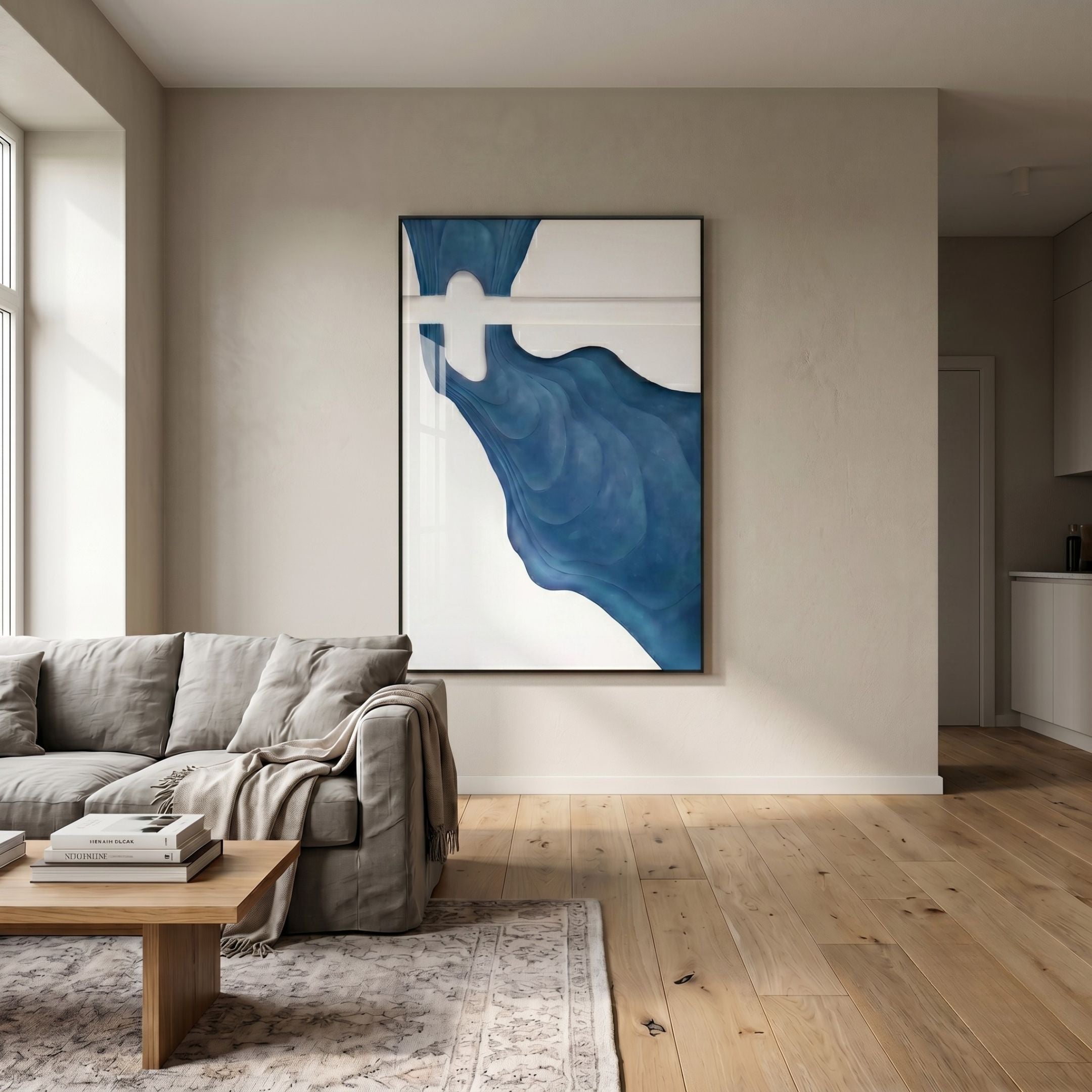 Fluvien Blue Flow 3D Carving Wall Art by Giant Sculptures displayed above a grey sofa in a modern living room with wooden flooring and a patterned rug.