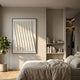 Velistra Arc Wave 3D Relief Wall Art by Giant Sculptures in matte white, hung above a linen-dressed bed beside a fiddle-leaf fig and a bookshelf nook.