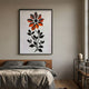 Floraventa Bloom I Floral 3D Carving Wall Art by Giant Sculptures, framed above a wooden bed with grey linens, beside a metal shelf of books and a vase.