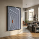 Kairo Linear Depth Slate 3D Carving Wall Art by Giant Sculptures displayed on a beige wall beside a modern living room with grey sofa and wood floor.