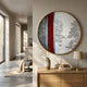 Orizon Crimson Horizon Round 3D Carving Wall Art by Giant Sculptures displayed above a wooden console with vase and lamp, beside a sunlit hallway.