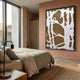Drosan Bark Trace I Wood Carving 3D Wall Art by Giant Sculptures with white organic relief on brown wood, black frame, above a bed in a terracotta bedroom.