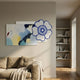 Bloomark Blue Floral Abstract Texture 3D Wall Art with cobalt bloom over pastel brushwork, displayed above a beige sofa beside built-in bookshelves.