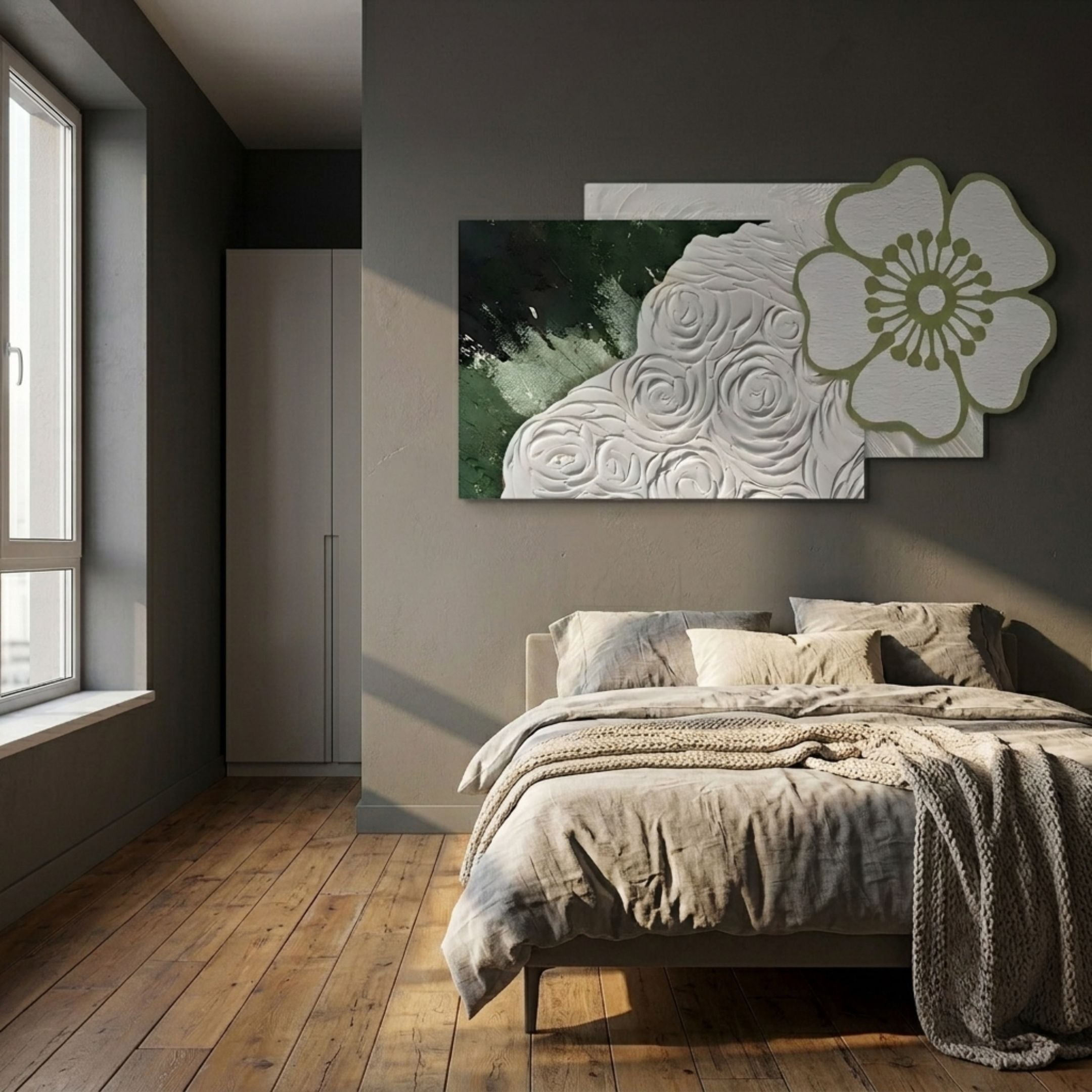 Bloomark Moss Floral White Rose Texture 3D Wall Art with sculpted white roses and green-trimmed flower motif, displayed above a linen bed in a grey bedroom.