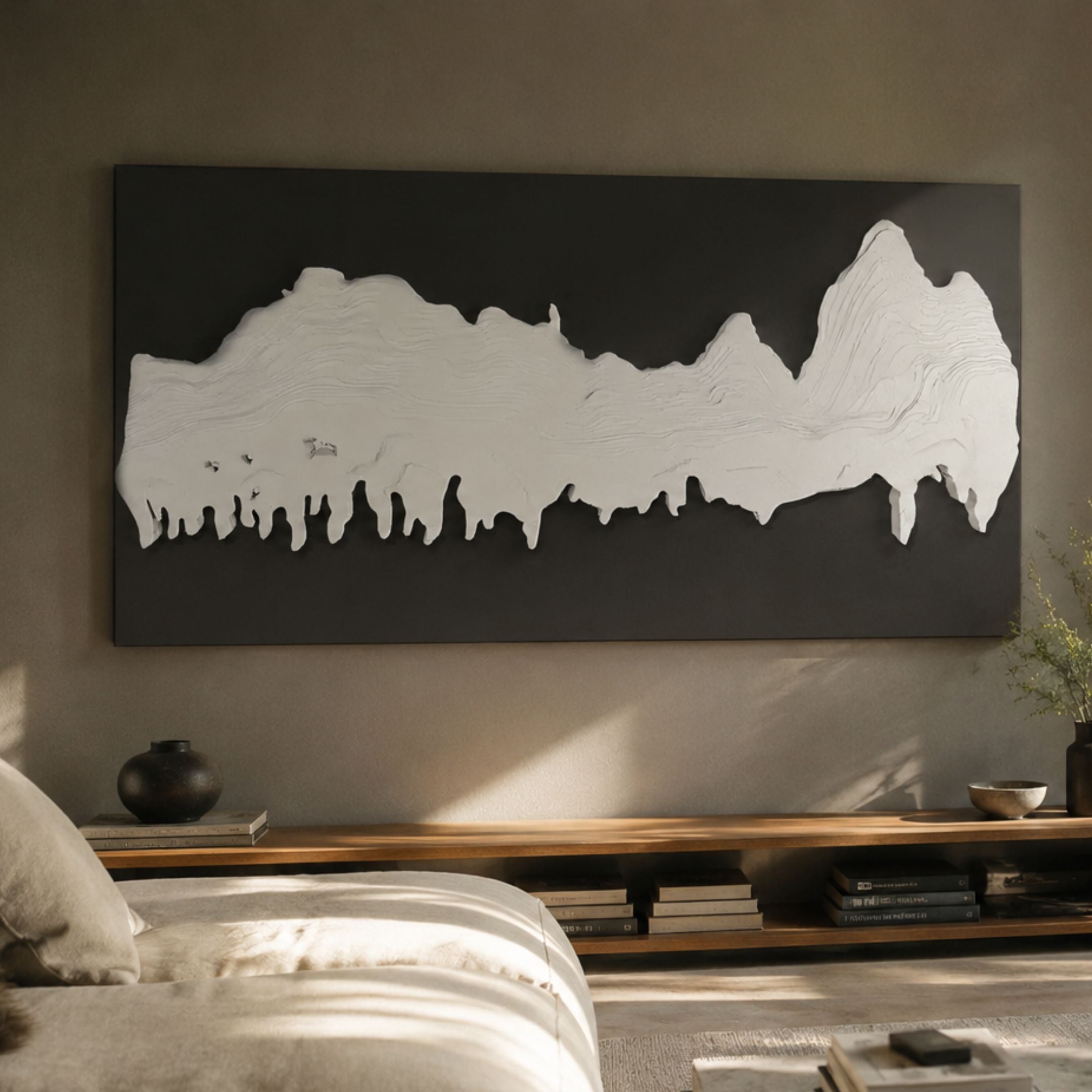 Riftline Panorama Charcoal Wood Carving 3D Wall Art by Giant Sculptures mounted above a low wooden console with books and ceramics in a warm living room.