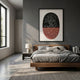 Noctara Orb Dusk Rose Carved 3D Wall Art by Giant Sculptures hung above a wooden bed with grey linens in a modern bedroom with dark grey walls.