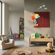 Snoopy Gridz Aurora March 3D Wall Art by Giant Sculptures displayed in a children's playroom above a wooden table with books, toys, and a Charlie Brown doll.