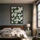 Scalara Green & White Vertical Acrylic 3D Wall Art in a black frame above a wooden bed with linen bedding, beside a concrete nightstand and lamp.