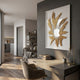 Lirien Crown Pearl Burst Gold Sculptural 3D Wall Art by Giant Sculptures mounted on a dark grey wall above a beige desk in a modern home office setting.