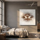 Echovia Bronze Linear Square Acrylic 3D Wall Art by Giant Sculptures displayed above a linen-dressed bed in a warm grey loft-style bedroom.