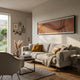 Flutine Amber Wave Gradient Acrylic 3D Wall Art by Giant Sculptures mounted above a beige sofa with mustard cushions in a sunlit modern living room.