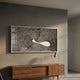 Fluxaris Black Flow Grid Acrylic 3D Wall Art by Giant Sculptures mounted above a walnut sideboard with a brass lamp in a sunlit grey-walled room.