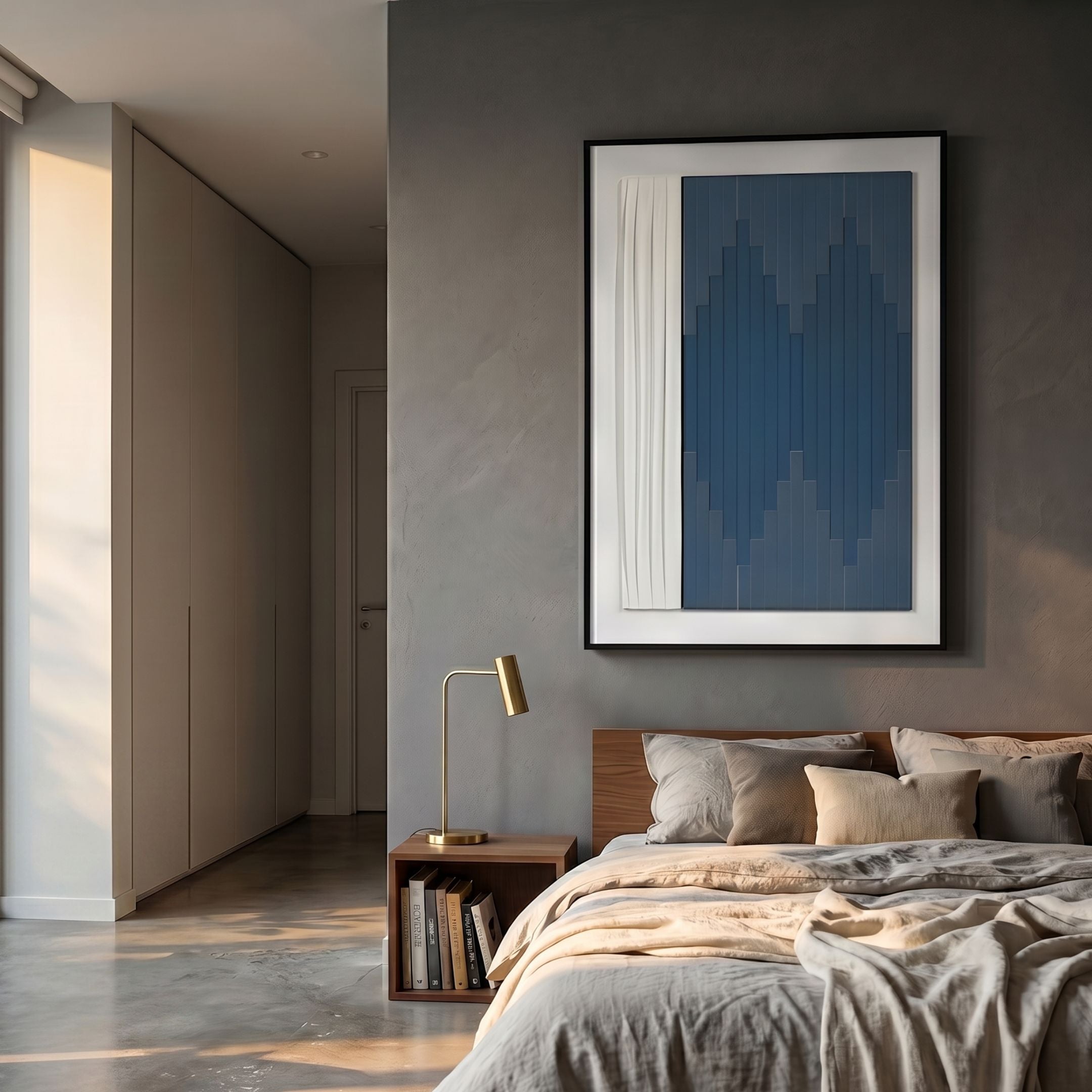 Trivaro Blue Panel II Wood Carving 3D Wall Art by Giant Sculptures displayed above a wooden bed with brass lamp in a modern bedroom with grey walls.