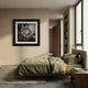 Prestivo Cigar & Vintage Camera Framed Display Wall Art mounted above a green-linen bed in a warm neutral bedroom with bookshelves and a wooden nightstand.