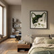 Verdifable Square Green Cat Portrait Moss 3D Wall Art in a black frame, hung above a bedside table in a Nordic bedroom with green linen bedding.