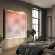 Current III Blush Coral & Snow White Acrylic 3D Wall Art by Giant Sculptures in a gold frame, displayed on a grey bedroom wall beside a tall window.