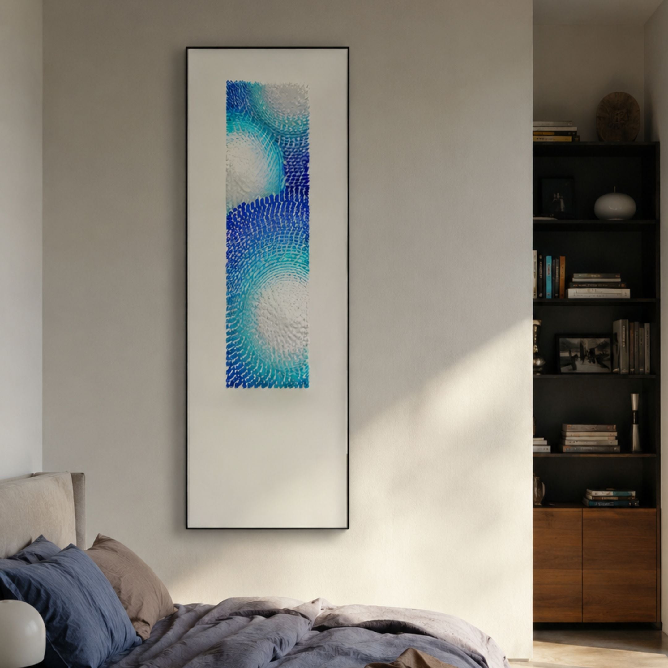 Glaciera Cerulean Mint Silver Acrylic 3D Wall Art by Giant Sculptures, framed vertically above a bed beside a dark bookshelf in a contemporary bedroom.