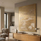 Dynasty Golden Cliffs Framed Acrylic 3D Wall Art by Giant Sculptures displayed on a cream living room wall above an oak sideboard with armchair and kitchen nearby.