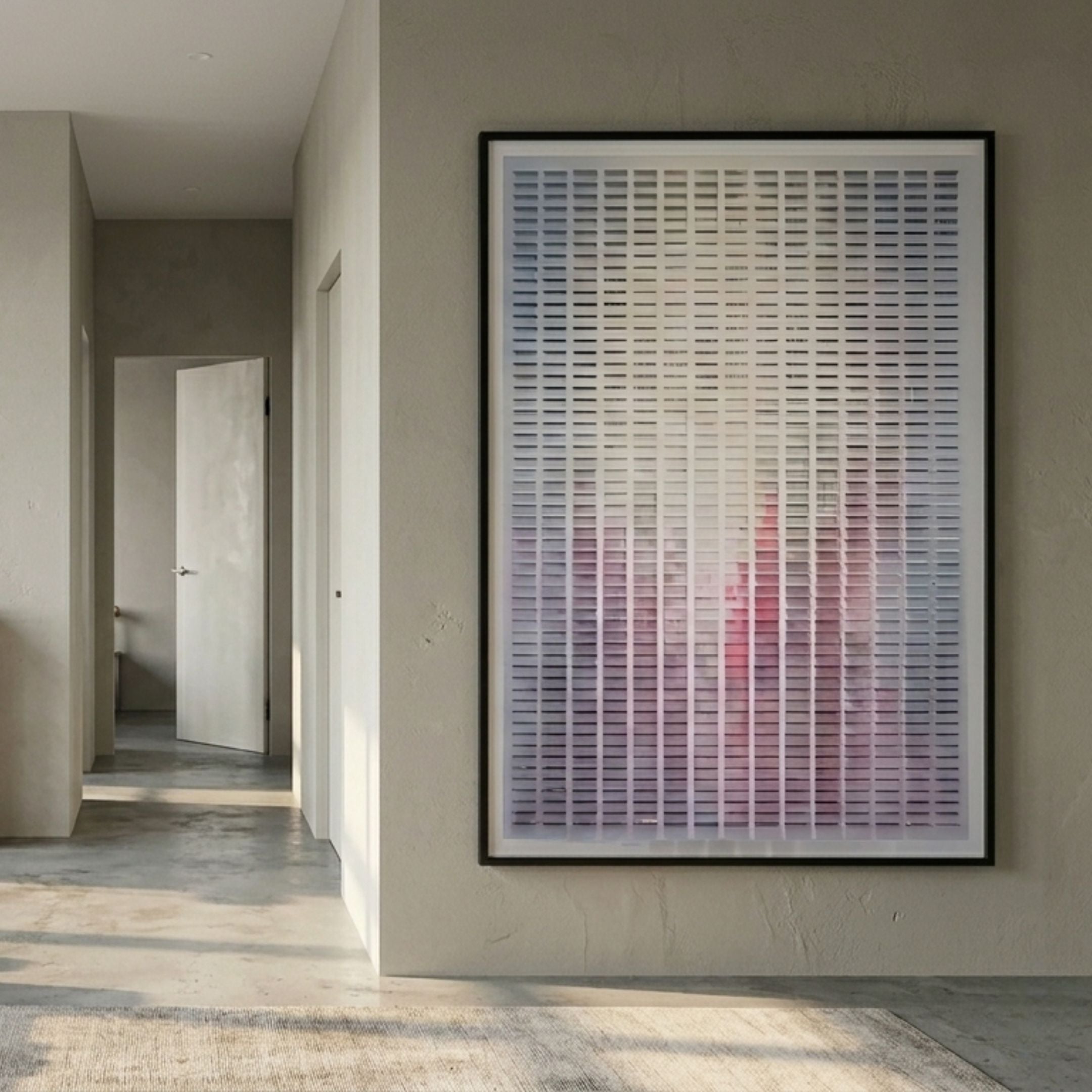 Chromat Orchid Blush Fade Acrylic 3D Wall Art by Giant Sculptures, framed in black on a hallway wall with concrete floor and open white doorway nearby.